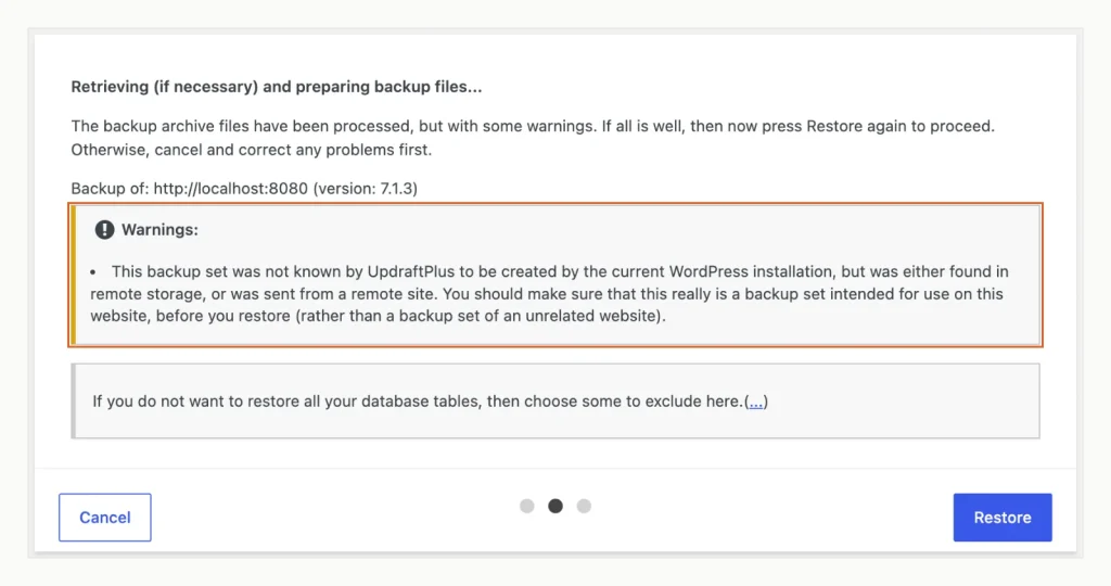 Screenshot of the UpdraftPlus restore step warning that the backup set was not created by the current WordPress installation, with a Restore button below.